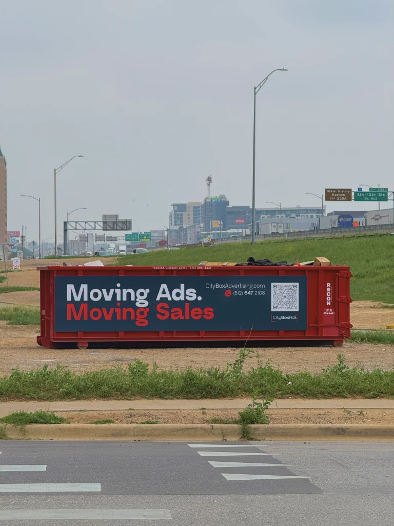 Moving Ads. Moving Sales. CityBox container beside a busy road
